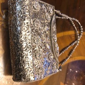 New, hand crafted metal and stone dress bag
